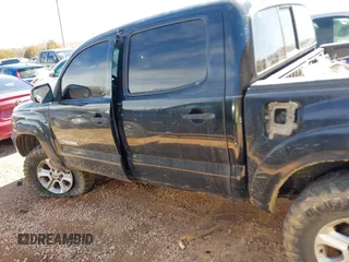 2013 Toyota Tacoma with VIN 3TMLU4EN3DM106670, listed as a IAAI auction lot 41696618 with 176,353 mi miles and . Bid and sale history available at DreamBid. Image 14.