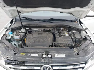 2020 Volkswagen Tiguan S with VIN 3VV1B7AX5LM079123, listed as a IAAI auction lot 41957273 with 89,449 mi miles and . Bid and sale history available at DreamBid. Image 10.