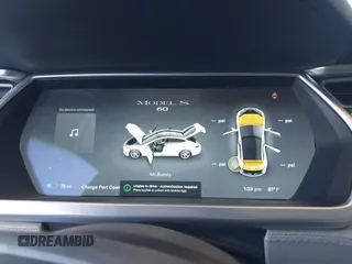2013 Tesla Model S с VIN 5YJSA1CG8DFP22036, выставлен на аукционе IAAI как лот 41886249 с пробегом 125 477 миль миль и . История ставок и продаж доступна на DreamBid. Изображение 7.