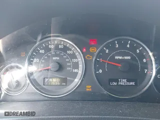 2010 Jeep Grand Cherokee Laredo with VIN 1J4PR4GK2AC135011, listed as a IAAI auction lot 41589996 with 111,536 mi miles. Bid and sale history available at carsss.com. Image 7.