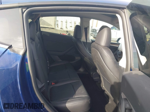 2025 Tesla Model Y Long Range with VIN 7SAYGDED2SF219423, listed as a IAAI auction lot 40984912 with 728 mi miles and . Bid and sale history available at DreamBid. Image 8.