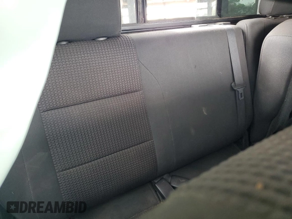 2012 Nissan Titan S z VIN 1N6AA0CJ9CN325160, wystawiony jako Copart lot #70004034 z przebiegiem 167 159 mil mil oraz Szkoda całkowita • Salvage title. Historia ofert i sprzedaży dostępna na DreamBid. Obrazek 10.