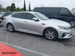 2019 Kia Optima LX with VIN 5XXGT4L3XKG285486, listed as a IAAI auction lot 41872981 with 101,981 mi miles. Bid and sale history available at carsss.com. Image 13.
