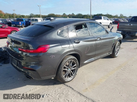 2020 BMW X4 M40i with VIN 5UX2V5C01L9C60394, listed as a IAAI auction lot 41351086 with 67,710 mi miles and . Bid and sale history available at DreamBid. Image 4.