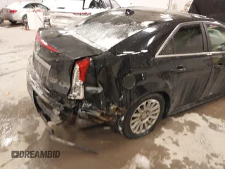 2010 Cadillac CTS with VIN 1G6DA5EG0A0110892, listed as a IAAI auction lot 41321333 with 112,851 mi miles and . Bid and sale history available at DreamBid. Image 6.