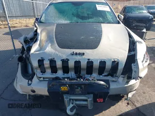 2015 Jeep Cherokee Latitude with VIN 1C4PJMCS4FW578401, listed as a IAAI auction lot 41014082 with 127,465 mi miles. Bid and sale history available at carsss.com. Image 12.
