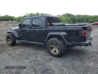 2021 Jeep Gladiator Sport S with VIN 1C6JJTAG4ML583148, listed as a Copart auction lot 59790835 with 48,623 mi miles and Salvage title. Bid and sale history available at DreamBid. Image 2.