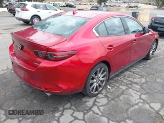 2021 Mazda 3 with VIN JM1BPBDL6M1305765, listed as a IAAI auction lot 42063684 with 61,011 mi miles and . Bid and sale history available at DreamBid. Image 4.