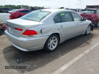2003 BMW 7 Series 745Li with VIN WBAGN63443DR14666, listed as a IAAI auction lot 42088916 with 164,846 mi miles and . Bid and sale history available at DreamBid. Image 4.