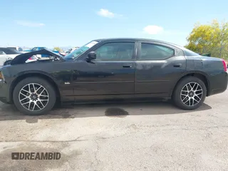 2010 Dodge Charger SXT with VIN 2B3CA3CV4AH153286, listed as a IAAI auction lot 42110970 with 162,424 mi miles and . Bid and sale history available at DreamBid. Image 14.