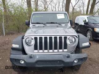 2020 Jeep Wrangler Unlimited Sport S z VIN 1C4HJXDN3LW115076, wystawiony jako IAAI lot #41921868 z przebiegiem 93 052 mil mil oraz . Historia ofert i sprzedaży dostępna na DreamBid. Obrazek 12.
