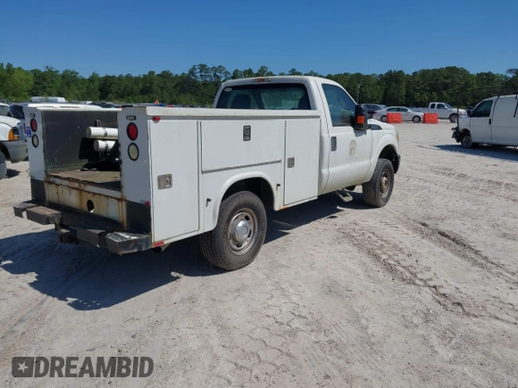 2014 Ford Super Duty F-250 SRW XL with VIN 1FDBF2B67EEA49254, listed as a IAAI auction lot 42136208 with 209,139 mi miles. Bid and sale history available at carsss.com. Image 4.