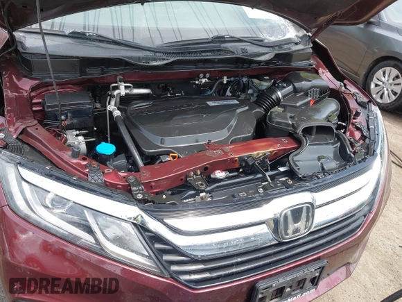 2018 Honda Odyssey EX with VIN 5FNRL6H56JB015557, listed as a IAAI auction lot 42112667 with Not provided miles and . Bid and sale history available at DreamBid. Image 6.