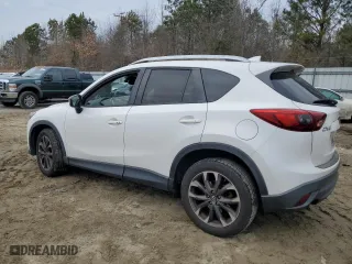 2016 Mazda CX-5 Grand Touring with VIN JM3KE2DY2G0860473, listed as a Copart auction lot 41800395 with 132,293 mi miles and Salvage Title. Bid and sale history available at carsss.com. Image 2.