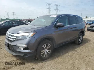2018 Honda Pilot EX-L with VIN 5FNYF6H52JB017857, listed as a Copart auction lot 59707415 with 71,402 mi miles and Salvage title. Bid and sale history available at DreamBid. Image 1.