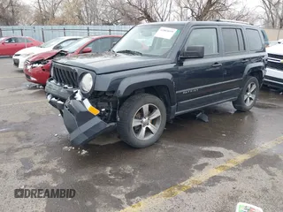 2016 Jeep Patriot Latitude with VIN 1C4NJRFB5GD545467, listed as a IAAI auction lot 41803699 with 172,398 mi miles. Bid and sale history available at carsss.com. Image 2.