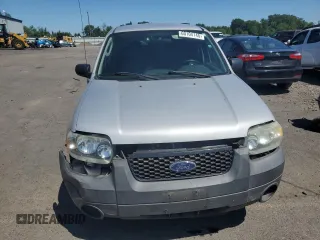 2005 Ford Escape XLS Value with VIN 1FMYU92Z55KC93604, listed as a Copart auction lot 60104145 with 86,788 mi miles and Salvage title. Bid and sale history available at DreamBid. Image 5.