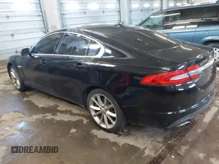 2015 Jaguar XF V6 Portfolio with VIN SAJWJ0FF5F8U57756, listed as a IAAI auction lot 41631278 with 47,158 mi miles. Bid and sale history available at carsss.com. Image 3.