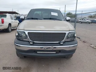 1999 Ford F-150 Work Series with VIN 1FTRF17WXXKA74403, listed as a IAAI auction lot 41525113 with 1 mi miles. Bid and sale history available at carsss.com. Image 6.