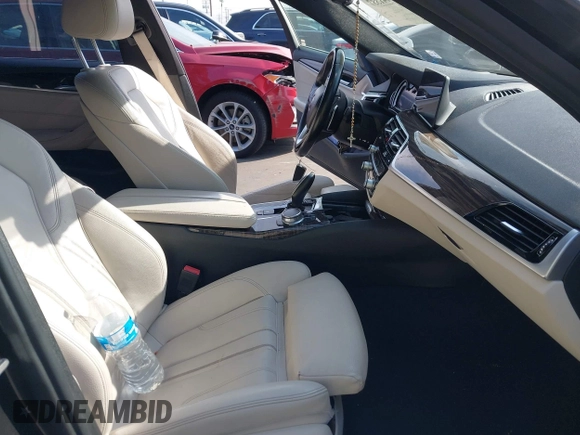 2017 BMW 5 Series 530i with VIN WBAJA5C34HG896047, listed as a IAAI auction lot 41441337 with 83,213 mi miles and . Bid and sale history available at carsss.com. Image 5.