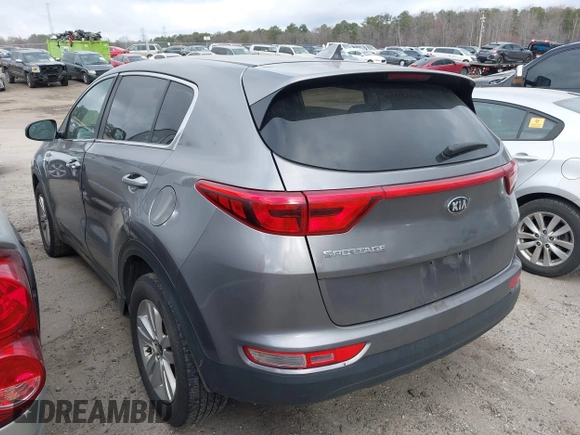 2017 Kia Sportage LX with VIN KNDPMCAC2H7236875, listed as a IAAI auction lot 41704229 with 183,094 mi miles and . Bid and sale history available at carsss.com. Image 3.