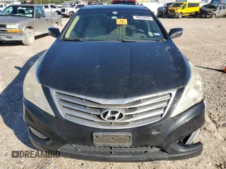 2012 Hyundai Azera z VIN KMHFH4JG0CA161867, wystawiony jako Copart lot #86928654 z przebiegiem 243 946 mil mil oraz Czysty tytuł • Clean title. Historia ofert i sprzedaży dostępna na DreamBid. Obrazek 5.