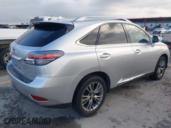 2014 Lexus RX 350 with VIN JTJZK1BA7E2012474, listed as a IAAI auction lot 42369456 with 127,380 mi miles and . Bid and sale history available at DreamBid. Image 4.