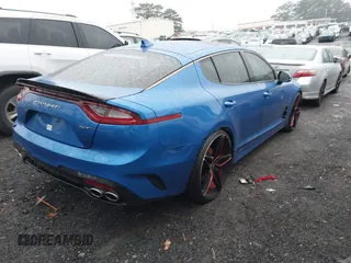 2018 Kia Stinger GT1 with VIN KNAE45LCXJ6018532, listed as a IAAI auction lot 41563629 with 91,043 mi miles. Bid and sale history available at carsss.com. Image 4.