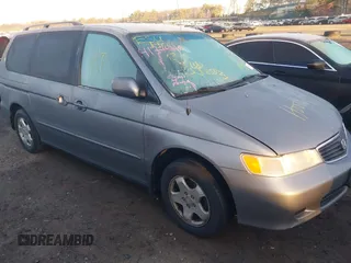 2000 Honda Odyssey EX with VIN 2HKRL1869YH599119, listed as a IAAI auction lot 41774615 with Not Provided miles and . Bid and sale history available at DreamBid. Image 6.