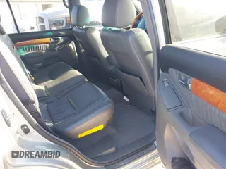 2003 Lexus GX 470 with VIN JTJBT20XX30015034, listed as a IAAI auction lot 41386690 with 234,983 mi miles. Bid and sale history available at carsss.com. Image 8.
