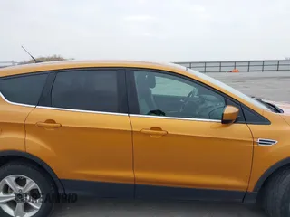 2016 Ford Escape SE z VIN 1FMCU9GX1GUC59233, wystawiony jako IAAI lot #41958573 z przebiegiem 133 223 mil mil oraz . Historia ofert i sprzedaży dostępna na DreamBid. Obrazek 14.