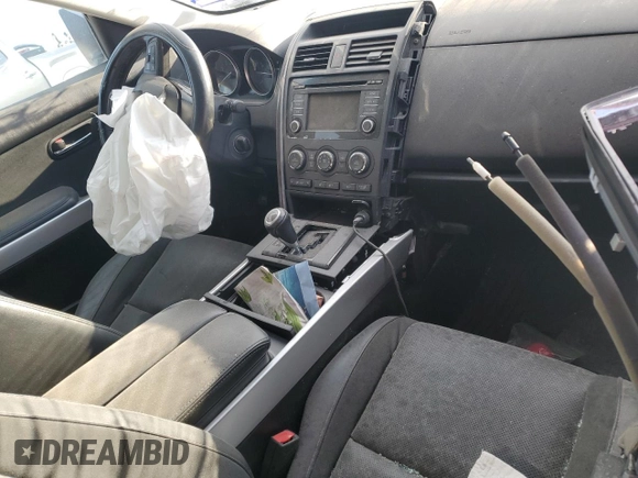 2015 Mazda CX-9 Grand Touring z VIN JM3TB2DA5F0468215, wystawiony jako Copart lot #53961975 z przebiegiem Nie podano mil oraz Szkoda całkowita • Salvage title. Historia ofert i sprzedaży dostępna na DreamBid. Obrazek 8.