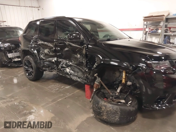 2017 Jeep Grand Cherokee SRT with VIN 1C4RJFDJ9HC739324, listed as a IAAI auction lot 40898998 with 92,547 mi miles. Bid and sale history available at carsss.com. Image 6.