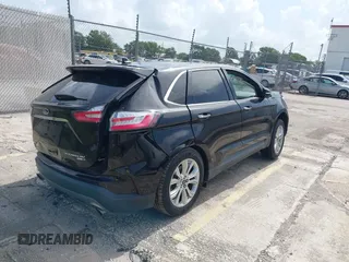 2020 Ford Edge Titanium with VIN 2FMPK4K93LBA05221, listed as a IAAI auction lot 42497787 with Not provided miles and . Bid and sale history available at DreamBid. Image 4.
