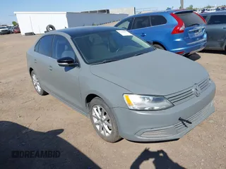 2014 Volkswagen Jetta SE with VIN 3VWD17AJ3EM420318, listed as a IAAI auction lot 42454507 with 96,332 mi miles and . Bid and sale history available at DreamBid. Image 1.