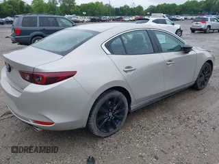 2024 Mazda 3 S Select Sport with VIN 3MZBPABM0RM403431, listed as a IAAI auction lot 42366921 with Not provided miles and . Bid and sale history available at DreamBid. Image 4.