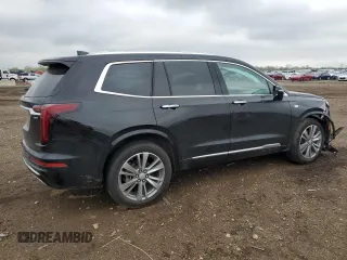 2022 Cadillac XT6 Premium Luxury z VIN 1GYKPFRS9NZ103281, wystawiony jako Copart lot #55118485 z przebiegiem 52 413 mil mil oraz Szkoda całkowita • Salvage title. Historia ofert i sprzedaży dostępna na DreamBid. Obrazek 3.