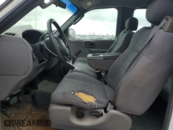 2003 Ford F-150 XL with VIN 2FTRX17273CA66963, listed as a Copart auction lot 55400945 with 244,942 mi miles and Clean title. Bid and sale history available at DreamBid. Image 7.