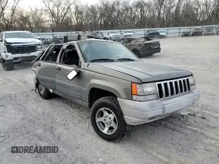 1996 Jeep Grand Cherokee Laredo with VIN 1J4FX58S0TC190128, listed as a Copart auction lot 42830345 with 0 mi miles and Salvage Title. Bid and sale history available at carsss.com. Image 12.