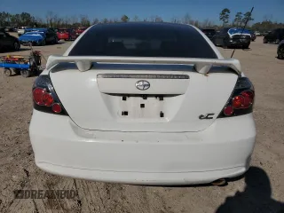2009 Scion tC with VIN JTKDE167990297899, listed as a Copart auction lot 48591365 with 122,056 mi miles and Salvage Title. Bid and sale history available at carsss.com. Image 6.