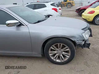2015 Chrysler 300 C with VIN 2C3CCAEG0FH779540, listed as a IAAI auction lot 41542982 with 211,348 mi miles and . Bid and sale history available at carsss.com. Image 18.