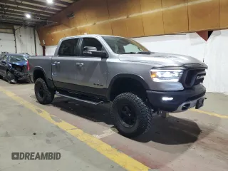 2022 Ram 1500 Rebel z VIN 1C6SRFLT1NN258780, wystawiony jako Copart lot #53040405 z przebiegiem 27 307 mil mil oraz Szkoda całkowita • Salvage title. Historia ofert i sprzedaży dostępna na DreamBid. Obrazek 4.