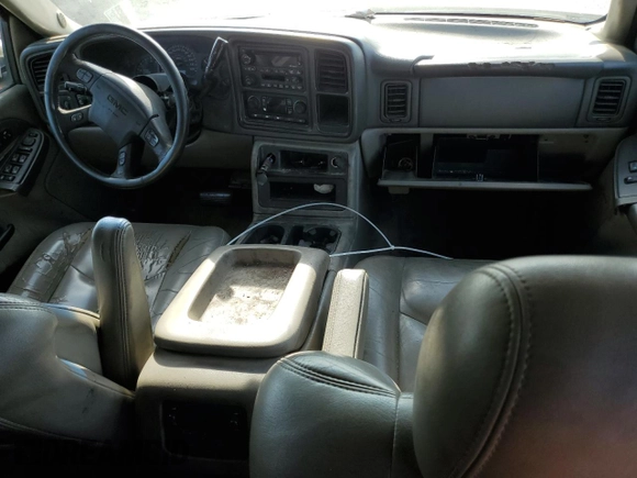 2003 GMC Yukon SLT with VIN 1GKEK13Z33J338897, listed as a Copart auction lot 68526664 with 0 mi miles and Salvage Title. Bid and sale history available at carsss.com. Image 8.