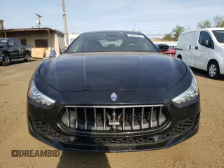 2018 Maserati Ghibli S Q4 z VIN ZAM57YTA5J1279909, wystawiony jako Copart lot #54559285 z przebiegiem 49 065 mil mil oraz Szkoda całkowita • Salvage title. Historia ofert i sprzedaży dostępna na DreamBid. Obrazek 5.