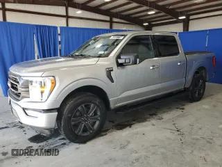 2023 Ford F-150 XL with VIN 1FTFW1E52PFB56941, listed as a Copart auction lot 53241715 with 21,965 mi miles and Clean Title. Bid and sale history available at carsss.com. Image 1.