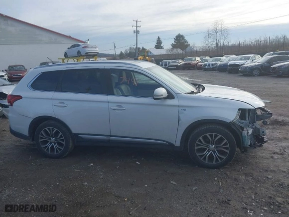 2016 Mitsubishi Outlander GT with VIN JA4JZ4AX4GZ054124, listed as a IAAI auction lot 41487441 with 137,000 mi miles. Bid and sale history available at carsss.com. Image 13.