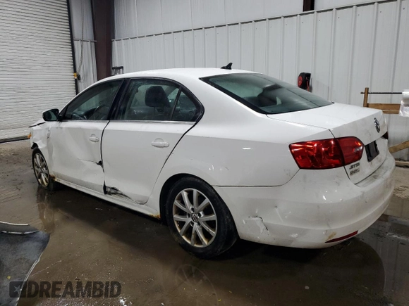 2013 Volkswagen Jetta SE with VIN 3VWDP7AJ9DM355097, listed as a Copart auction lot 62065445 with 196,943 mi miles and Salvage title. Bid and sale history available at DreamBid. Image 2.