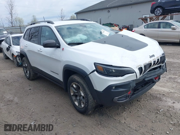 2019 Jeep Cherokee Trailhawk Elite with VIN 1C4PJMBX4KD351261, listed as a IAAI auction lot 41944727 with 97,849 mi miles. Bid and sale history available at carsss.com. Image 14.