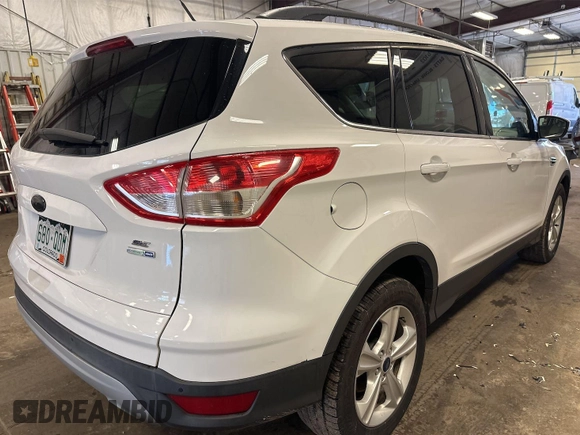 2014 Ford Escape SE with VIN 1FMCU9G94EUD80272, listed as a IAAI auction lot 42737727 with 138,226 mi miles and . Bid and sale history available at DreamBid. Image 7.