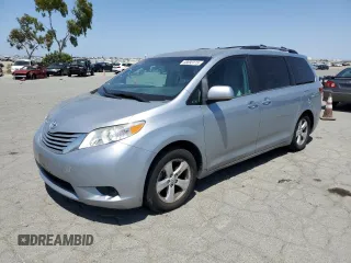 2015 Toyota Sienna LE AAS with VIN 5TDKK3DCXFS632759, listed as a Copart auction lot 58893115 with 157,530 mi miles and Salvage title. Bid and sale history available at DreamBid. Image 1.